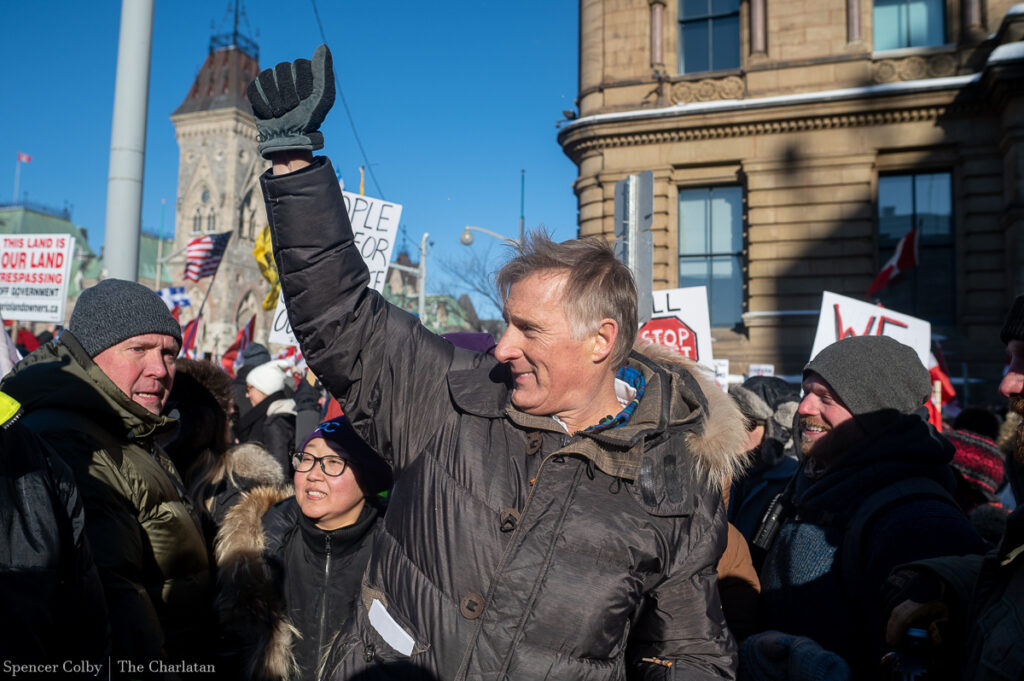 Peoples Party of Canada (PPC) leader Maxime Bernier waves to supporters during a rally against COVID-19 restrictions in Ottawa, Ont.