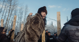 Sabina Dennis stands her ground as police dismantle the barricade to enforce the injunction filed by the Coastal Gaslink pipeline at the Gidimt’en checkpoint near Houston, B.C., on January 7, 2019. The pipeline company was given a permit but the Office of the Wet’suwet’en, which has jurisdiction over the territory in question, has never given consent Photo: Amber Bracken