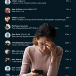 A woman in distress reading social media comments