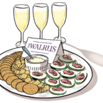 A cheese platter and champagne glasses with a 'The Walrus' tag on it
