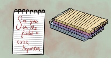 The background of the image is a light pink, in the foreground, a white ringed notepad is pictured. The notepad reads “See you in the field, xoxo Reporter,” written in cursive. Behind the notepad, lies four other notepads stacked on top of each other. From the bottom up, the colors are blue, purple, pink, and yellow.